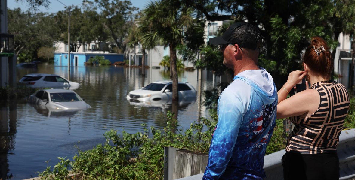 Vehicles Submerged In Floodwater In An Apartment Complex