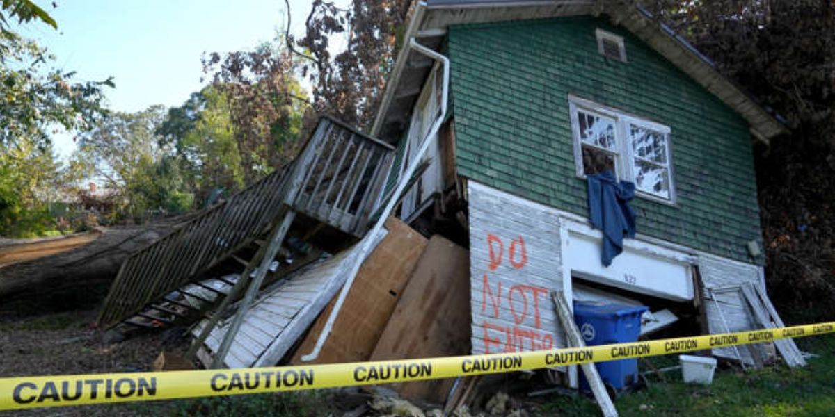 A House Sits Damaged Due To Flooding And High-Speed Winds