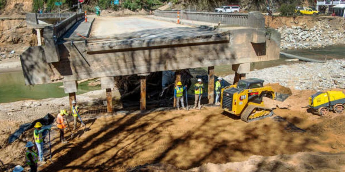 A Large Section Of A Bridge Was Washed Out