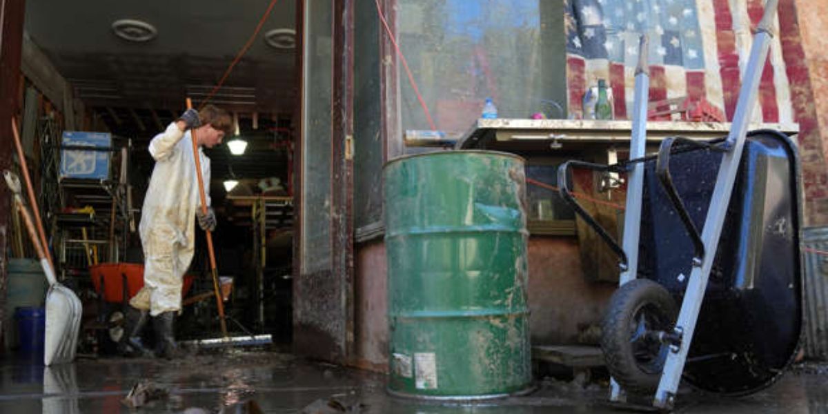 Allen Glick Cleans Water Out Of A Residential Building