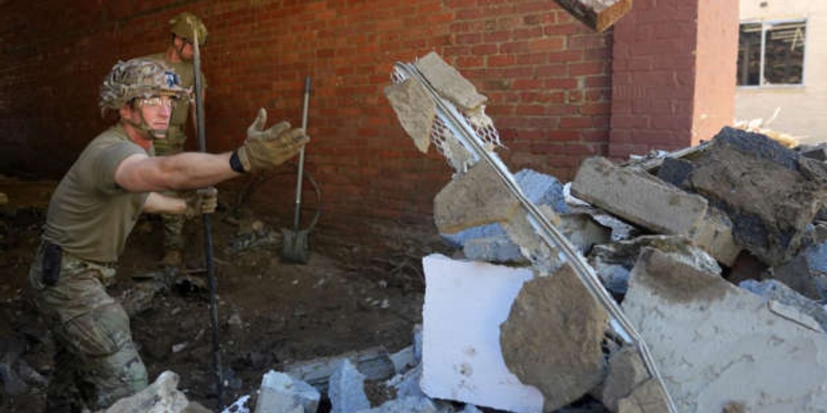 Evan Cummins Helps In Cleaning The Debris