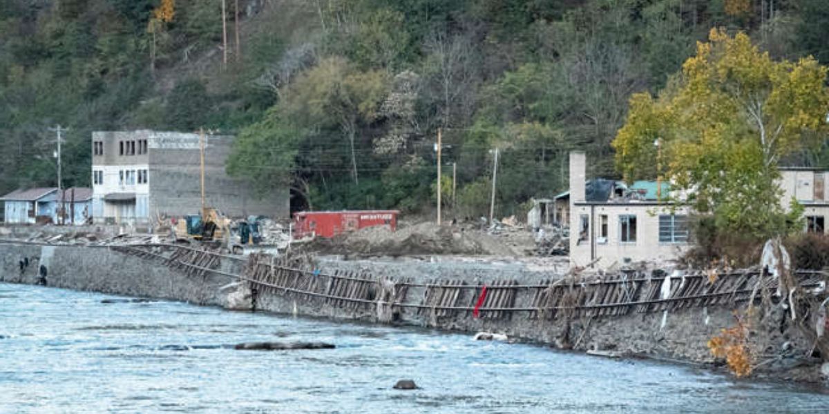 Train Track Hang From The Bank Of The River