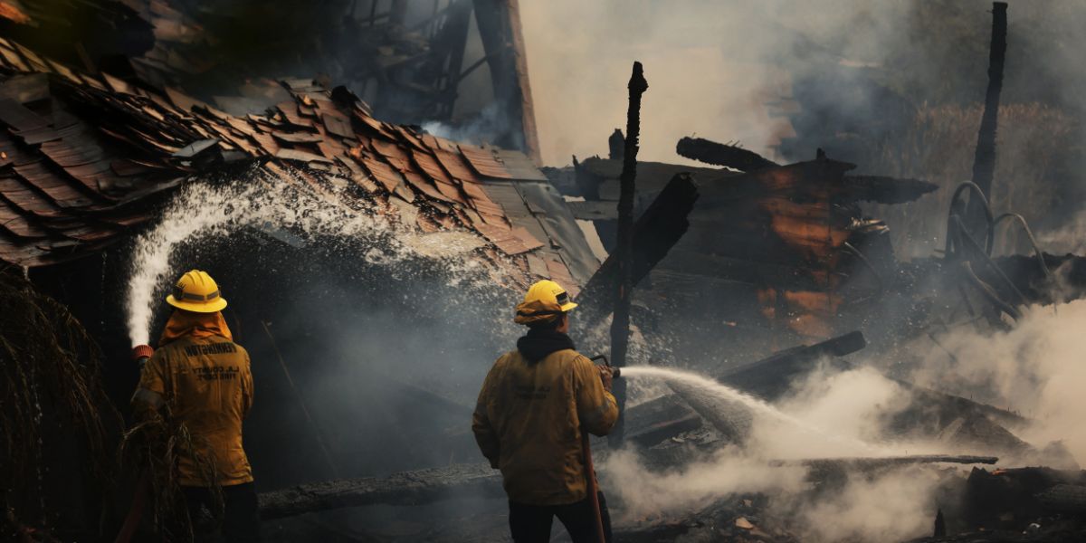 Firefighters spraying water